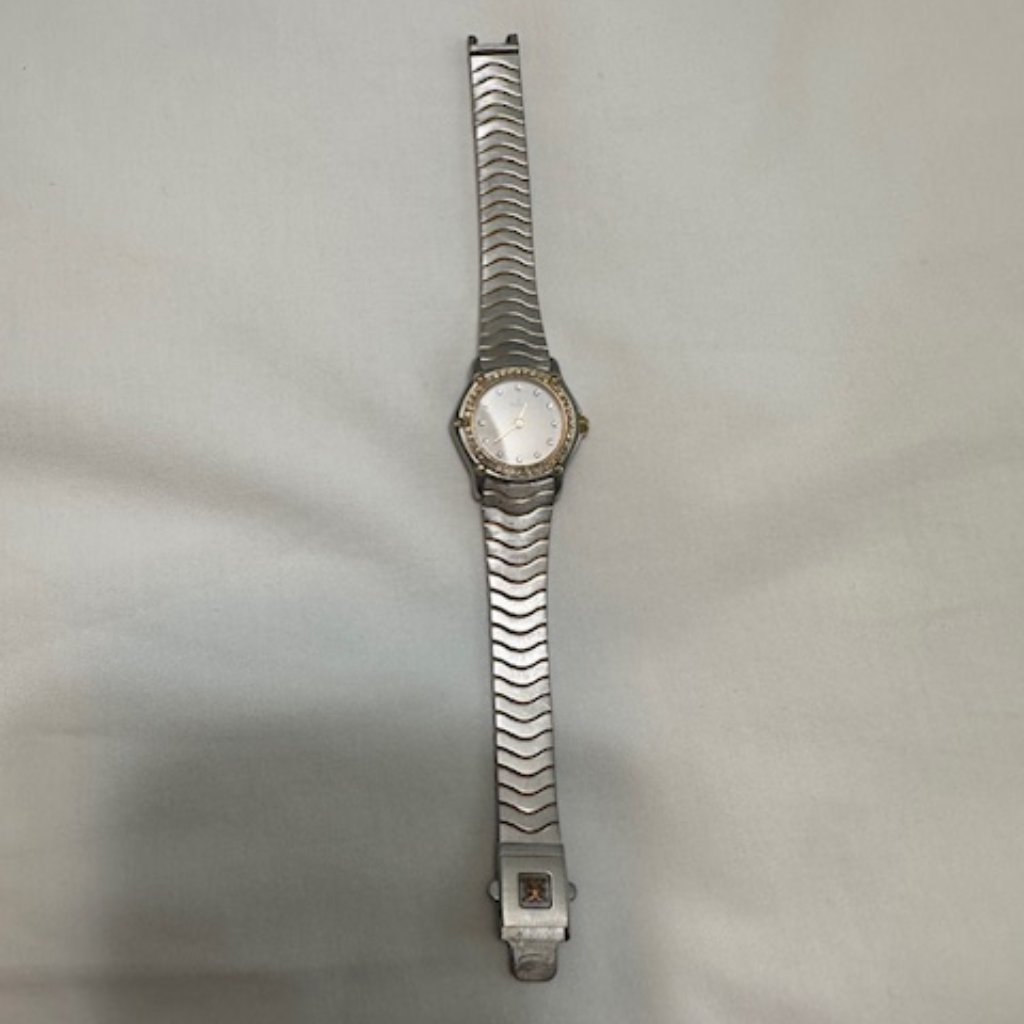 Ebel Womans Classic Wave Watch Diamond Bezel And Diamond Hour Markers
